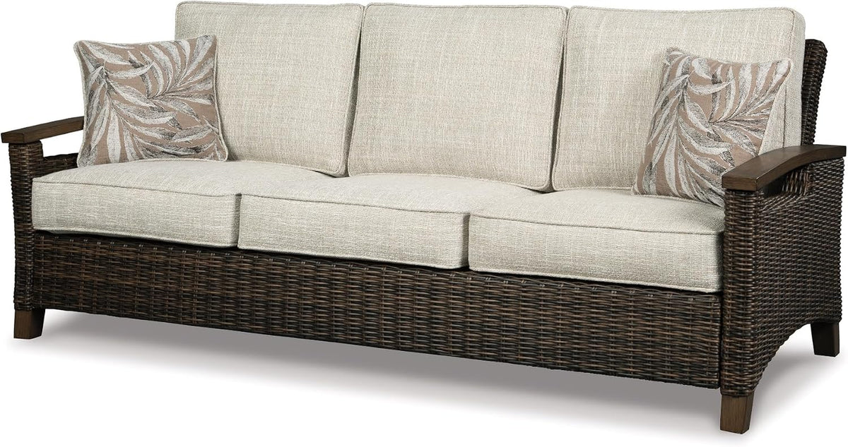 Upgrade Your Outdoor Space with the Signature Design by Ashley Brown Paradise Trail Round Wicker Fire Pit Table
